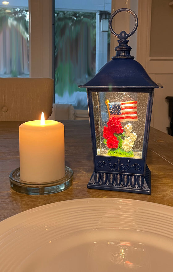 Patriotic Water Lantern with American Flag, 11.5 Inch, LED Light, Swirling Glitter Snow Globe Design, Battery/USB Powered, Blue, Red and White Geranium Flowers