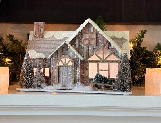 TenWaterloo Lighted Christmas Village House with Timer, 11" x 7.5", Battery Operated, Glittered Snowy Cabin with Sisal Trees and Cut Paper