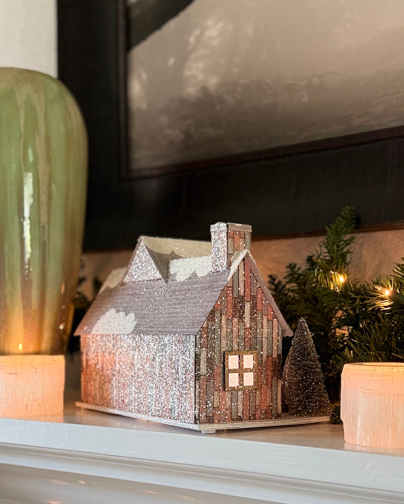 TenWaterloo Lighted Christmas Village House with Timer, 11" x 7.5", Battery Operated, Glittered Snowy Cabin with Sisal Trees and Cut Paper