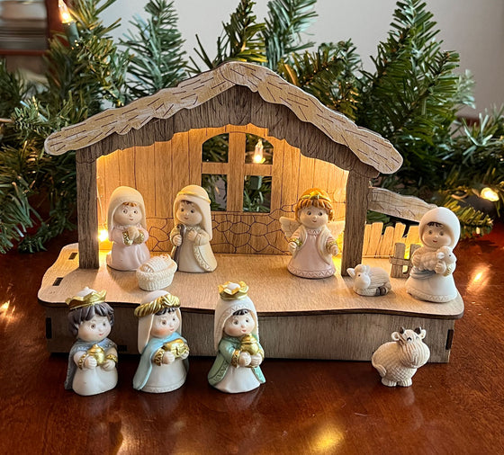 Lighted Christmas Tabletop Nativity with 10 Figurines, 8 x 5.5 inches, Blue with Gold Accents, Battery Operated, Wood Creche and Polyresin Figurines