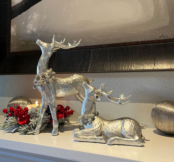 TenWaterloo Silver Sparkled Christmas Reindeer Figurine Set of 2, Sculpted Resin Deer Statues, 12 Inches High, with Pinecone Garland Accents