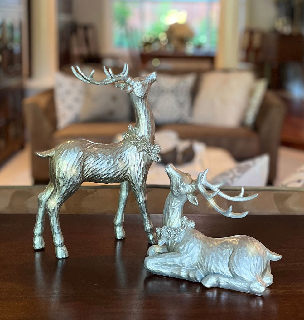 TenWaterloo Silver Sparkled Christmas Reindeer Figurine Set of 2, Sculpted Resin Deer Statues, 12 Inches High, with Pinecone Garland Accents